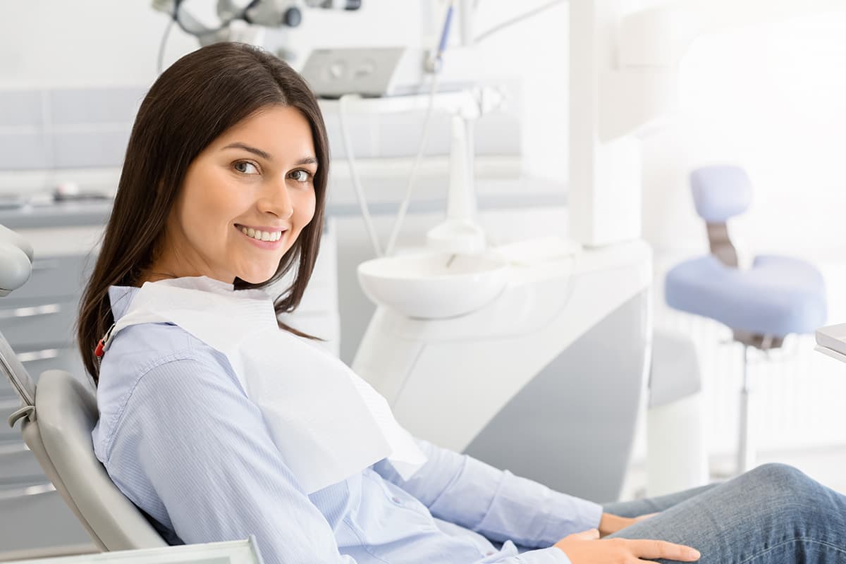 woman learns about the importance of dental work after the holidays